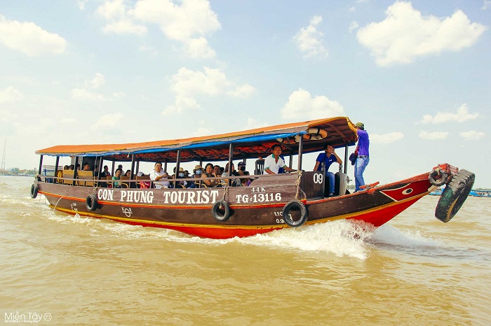 A private boat for a cruise along the Tien River